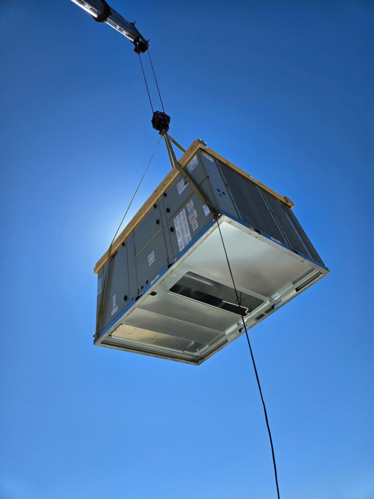 commercial gallery - unit being lifted